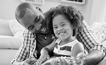 Black and white photo of father and daughter