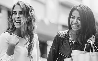 Black and white photo of women shopping