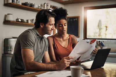 Couple reviewing paperwork