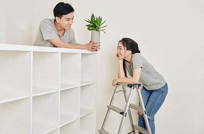 Couple decorating their apartment