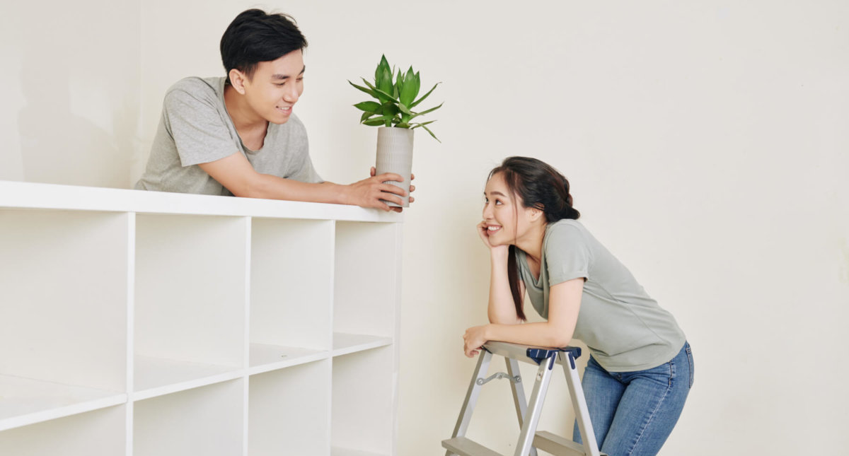 Couple decorating their apartment