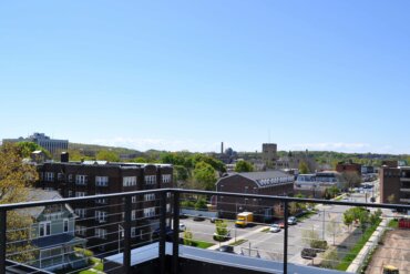 A photo of South Union Street from the rooftop deck of Building D.