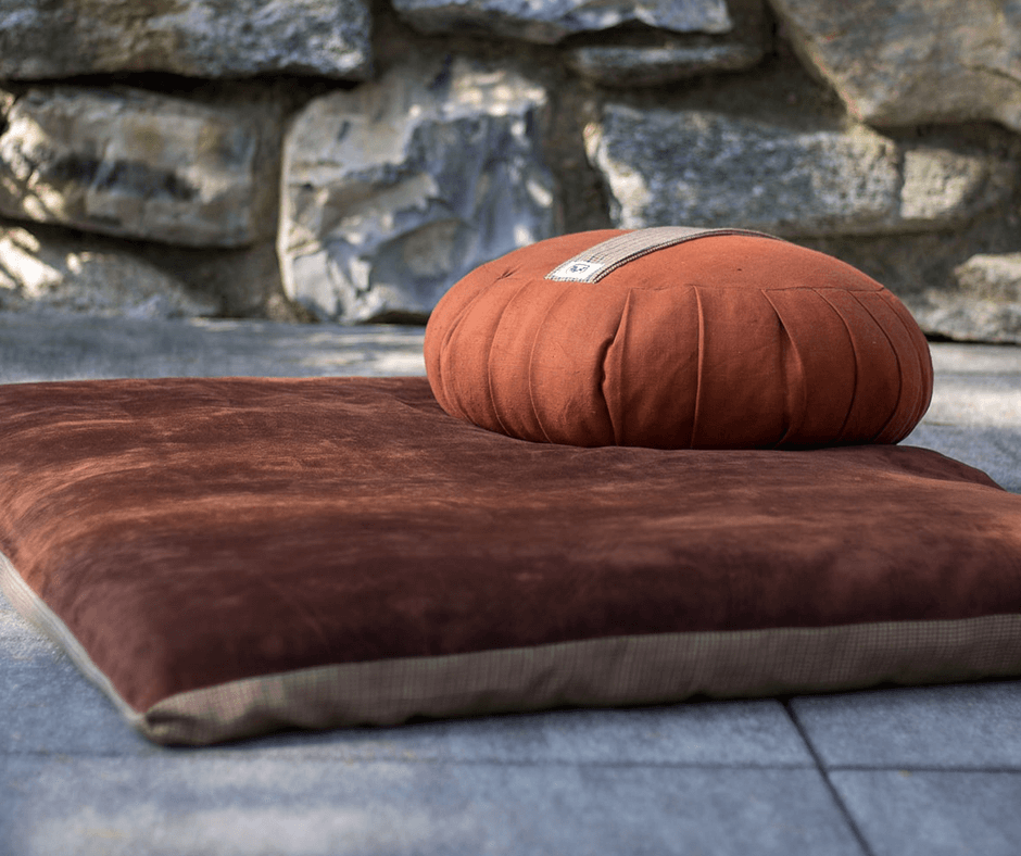 Two meditation pillows on the floor. Image credit: Susanna Marsiglia