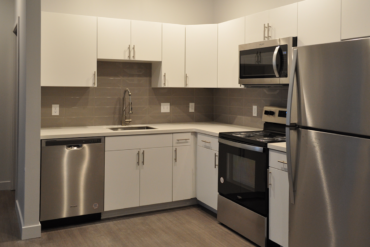 The kitchen is complete in this one-bedroom apartment (unit 1C) in Building A.