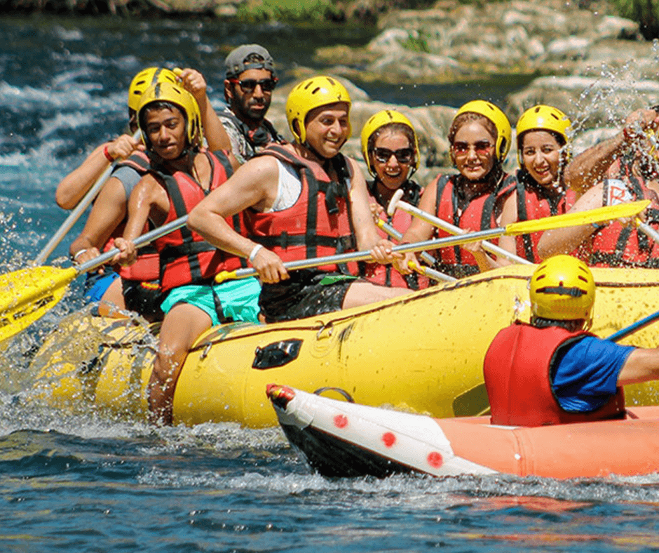 A group of people whitewater rafting on a river. Image credit: Hilmi Işılak