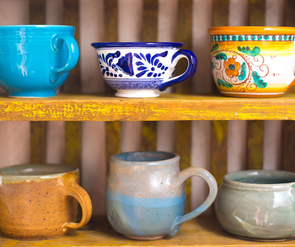 Mismatched mugs on a shelf. Image credit: iStock.